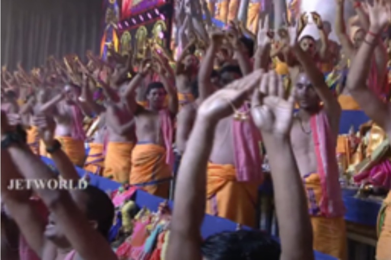 Archaka-swamis displaying the mangala-sutras to us before offering to Lord to tie to bride