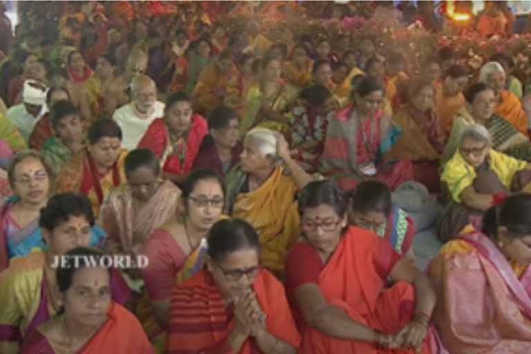 Devotees participating in morning seva kalam near yaga sala